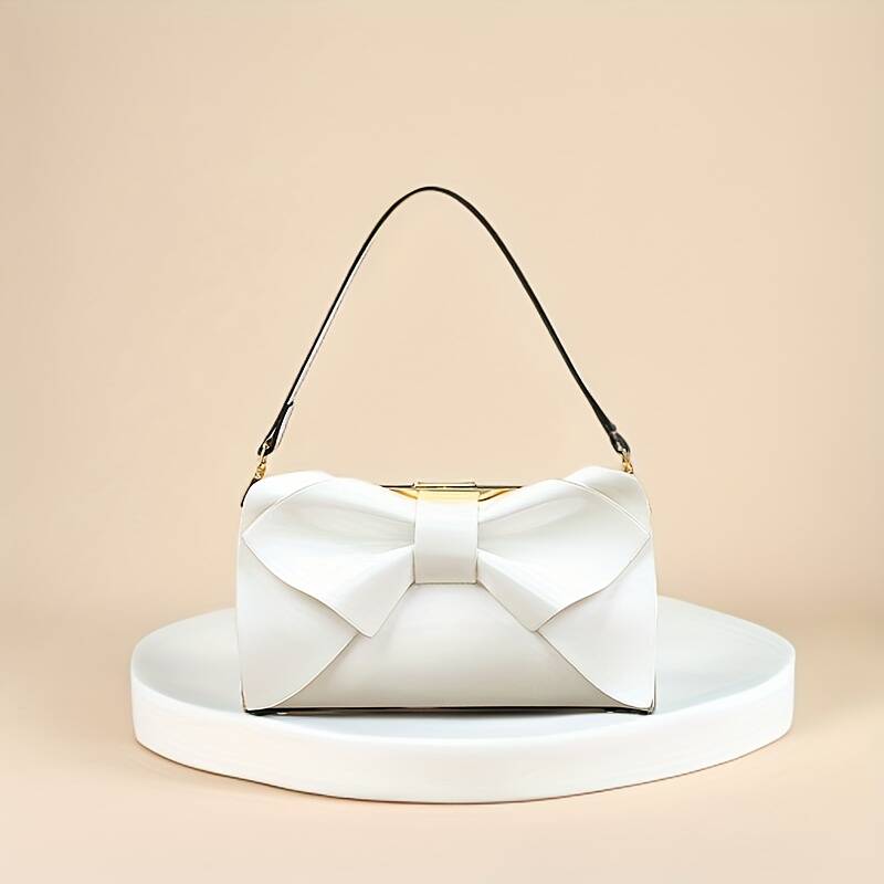 Pochette da sera in raso con fiocco e tracolla_voghion.com