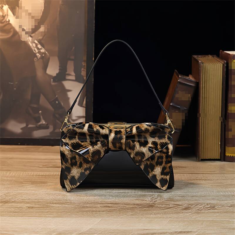 Pochette da sera in raso con fiocco e tracolla_voghion.com