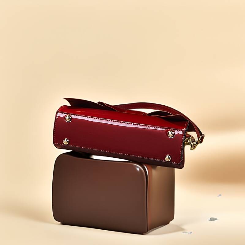 Pochette da sera in raso con fiocco e tracolla_voghion.com