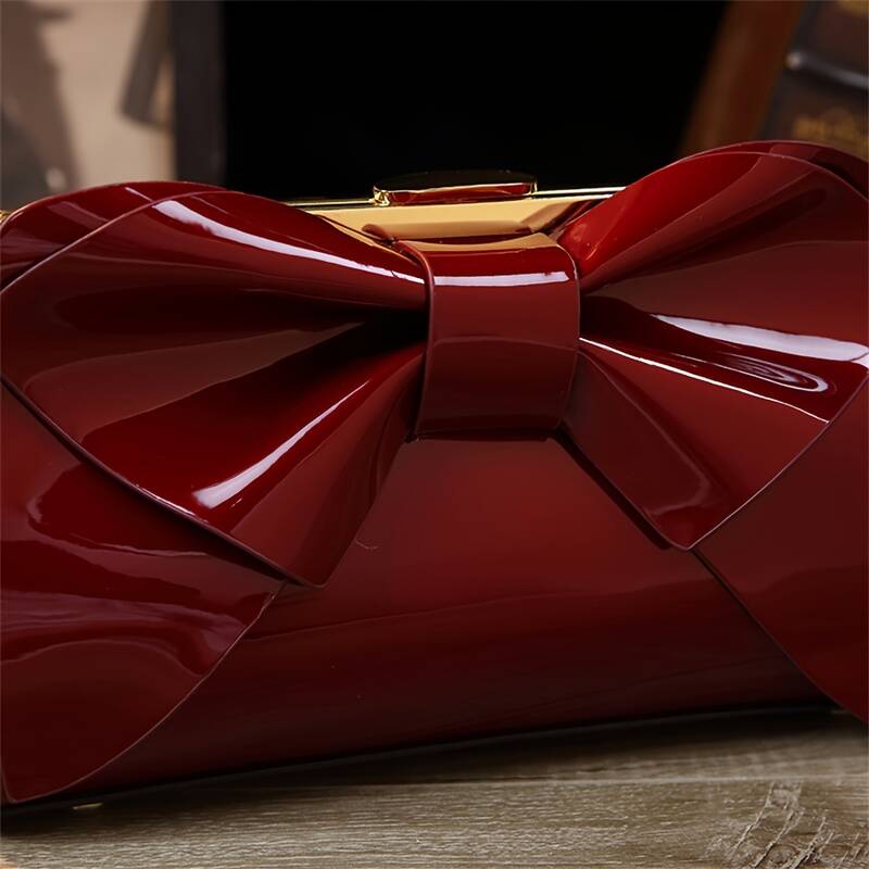 Pochette da sera in raso con fiocco e tracolla_voghion.com
