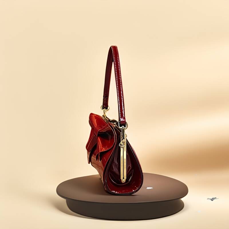 Pochette da sera in raso con fiocco e tracolla_voghion.com